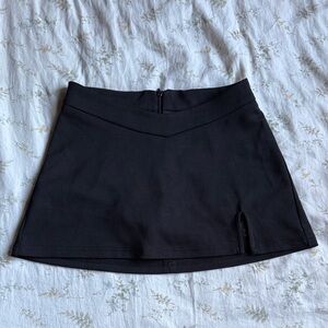 Black mini skirt with built in shorts size extra small in great condition